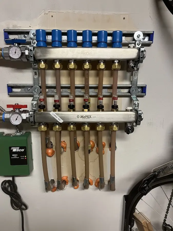 Plumber performing Water Heater Repair at a residential property in Forest Park